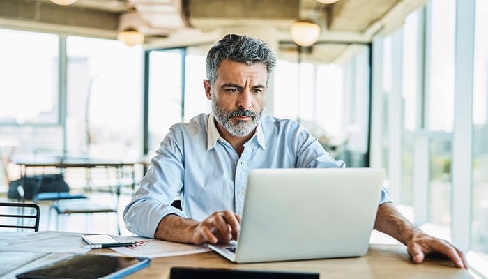 man using laptop